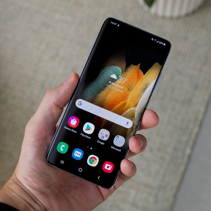 An image of the Samsung Galaxy S21 being held in a hand