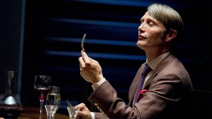 Dr. Lecter looks at a fork in Hannibal.