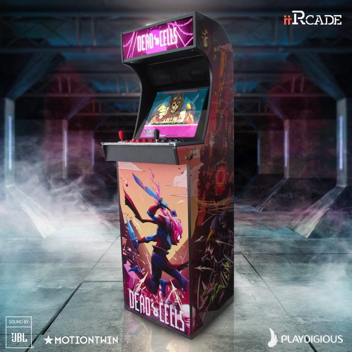 iiRcade's Dead Cells arcade cabinet stands in a smoky corridor.