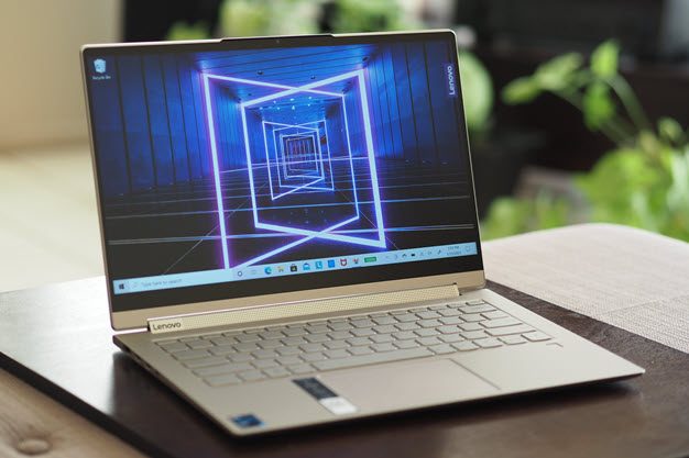 The Lenovo Yoga 91 laptop with the screen showing a scene with lasers.