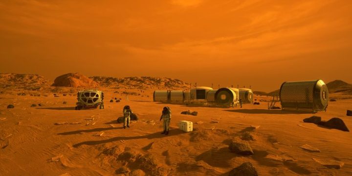 This concept depicts astronauts and human habitats on Mars.