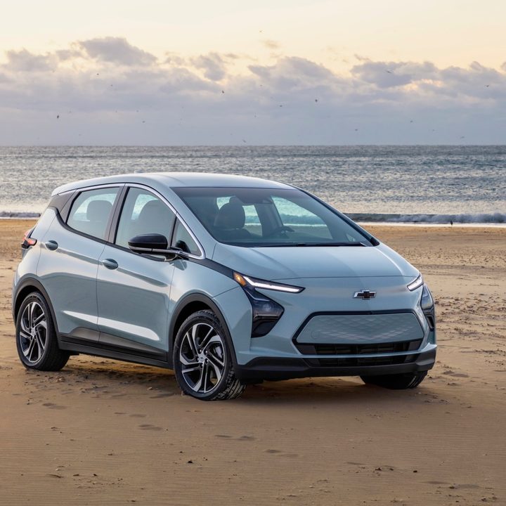 A Chevy Volt parked on the beach.
