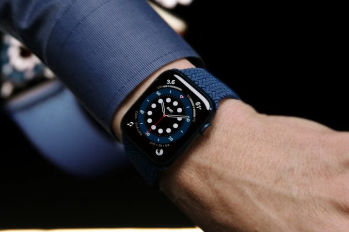 Close up of a man showing off the Apple Watch Series 6 on his wrist