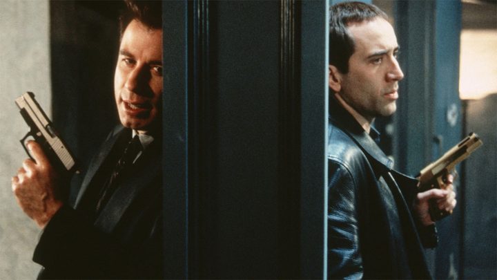 Sean and Castor having a conversation through a wall in Face/Off.