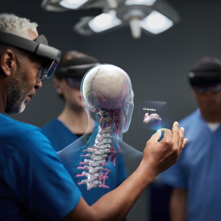 surgeons wear Hololens 2 headsets in the OR
