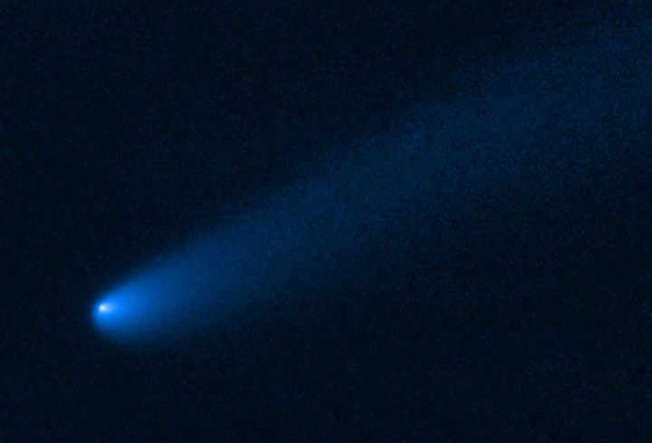 NASA's Hubble Space Telescope snapped this image of the young comet P/2019 LD2 as it orbits near Jupiter&rsquo;s captured ancient asteroids, which are called Trojans. The Hubble view reveals a 400,000-mile-long tail of dust and gas flowing from the wayward comet's bright solid nucleus. 