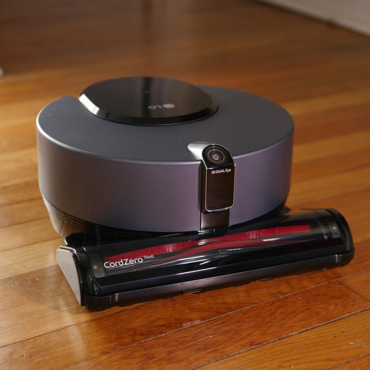 LG CordZero ThinQ Robot Vacuum angled shot on floor.