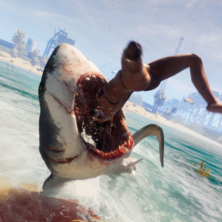 A shark about to swallow a woman on a beach.