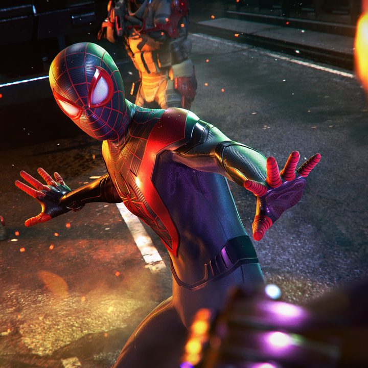 Miles Morales in Spider-Man outfit fending off crime.