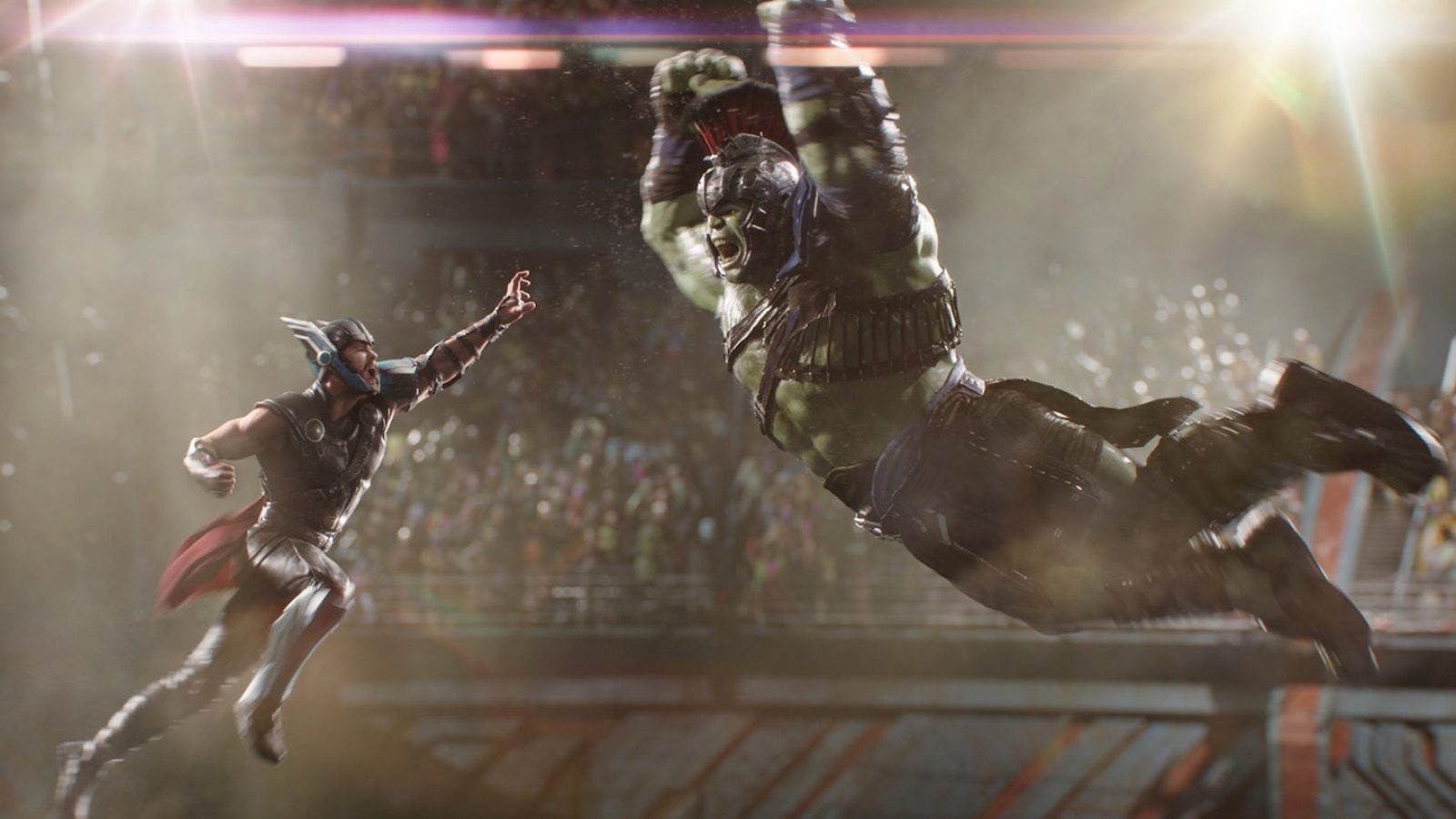 Thor and the Hulk jumping towards each other in "Thor: Ragnarok."
