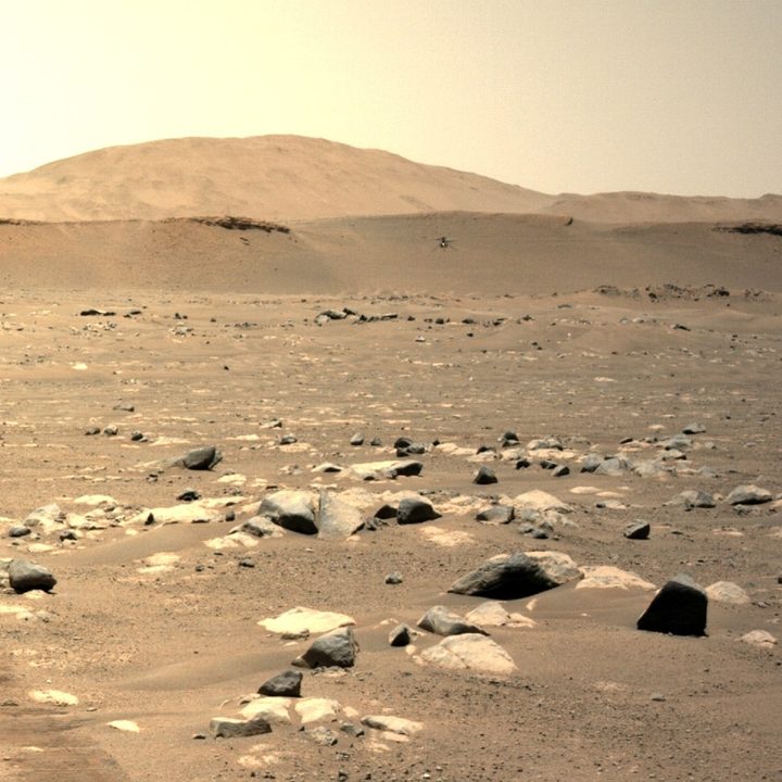 NASA’s Ingenuity Mars Helicopter can be seen hovering during its third flight on April 25, 2021, as seen by the left Navigation Camera aboard NASA’s Perseverance Mars rover.