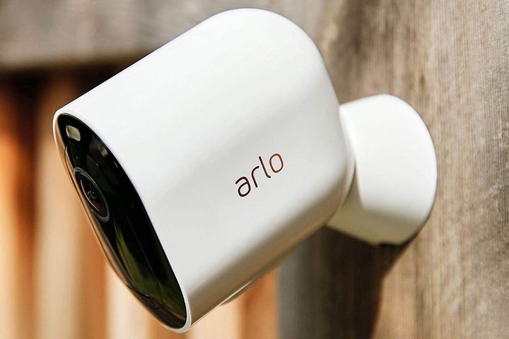 The Arlo Pro 4 home security camera installed outdoors.