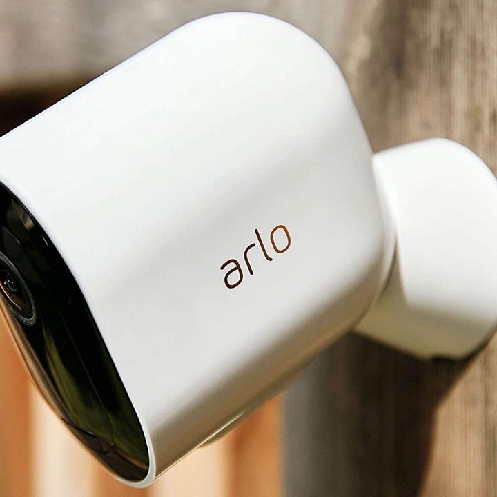 The Arlo Pro 4 home security camera installed outdoors.