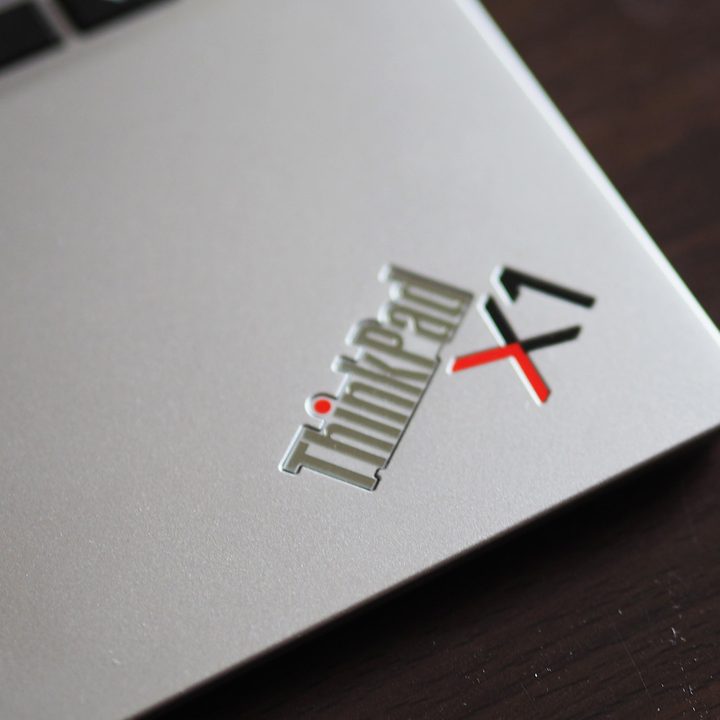 Lenovo ThinkPad X1 Titanium Yoga shell showing the ThinkPad logo.