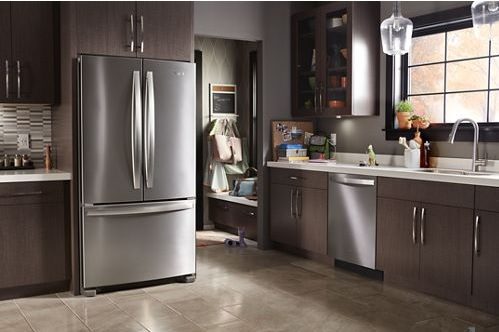 The Whirlpool 25.2-cu. ft. 3-Door 36-in French Door Refrigerator in a kitchen.
