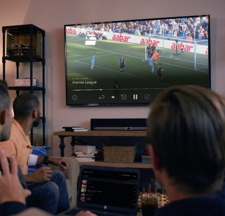 A family watching TV.