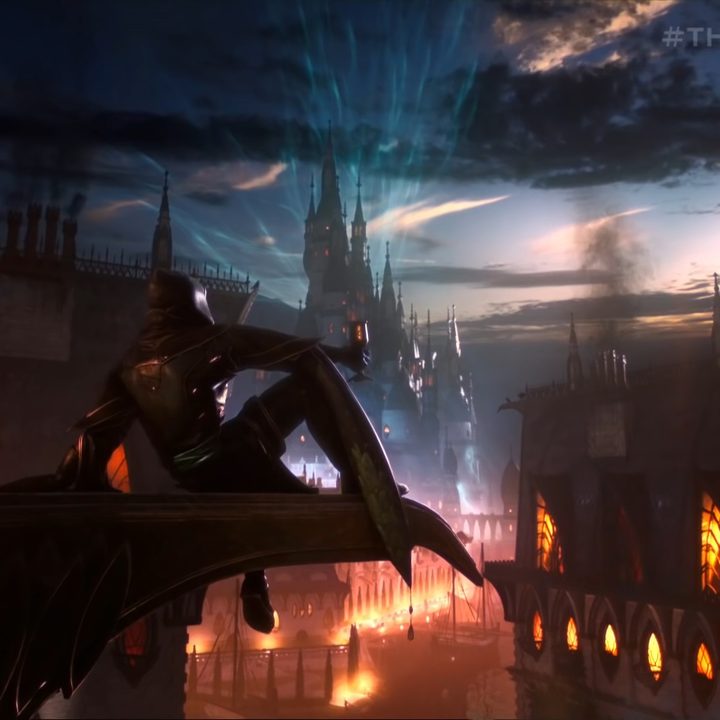 A cloaked figure sitting on a roof.