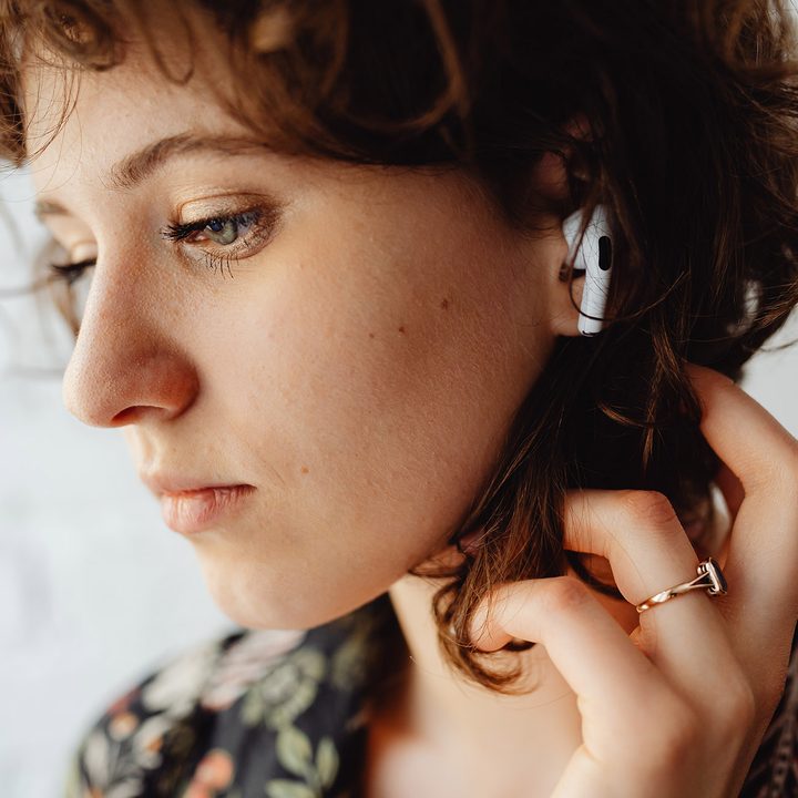 woman wearing airpods pro