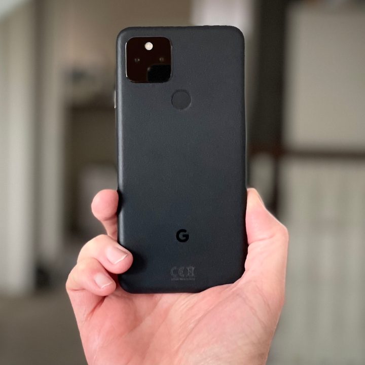 Google Pixel 5 held in hand, seen from the back