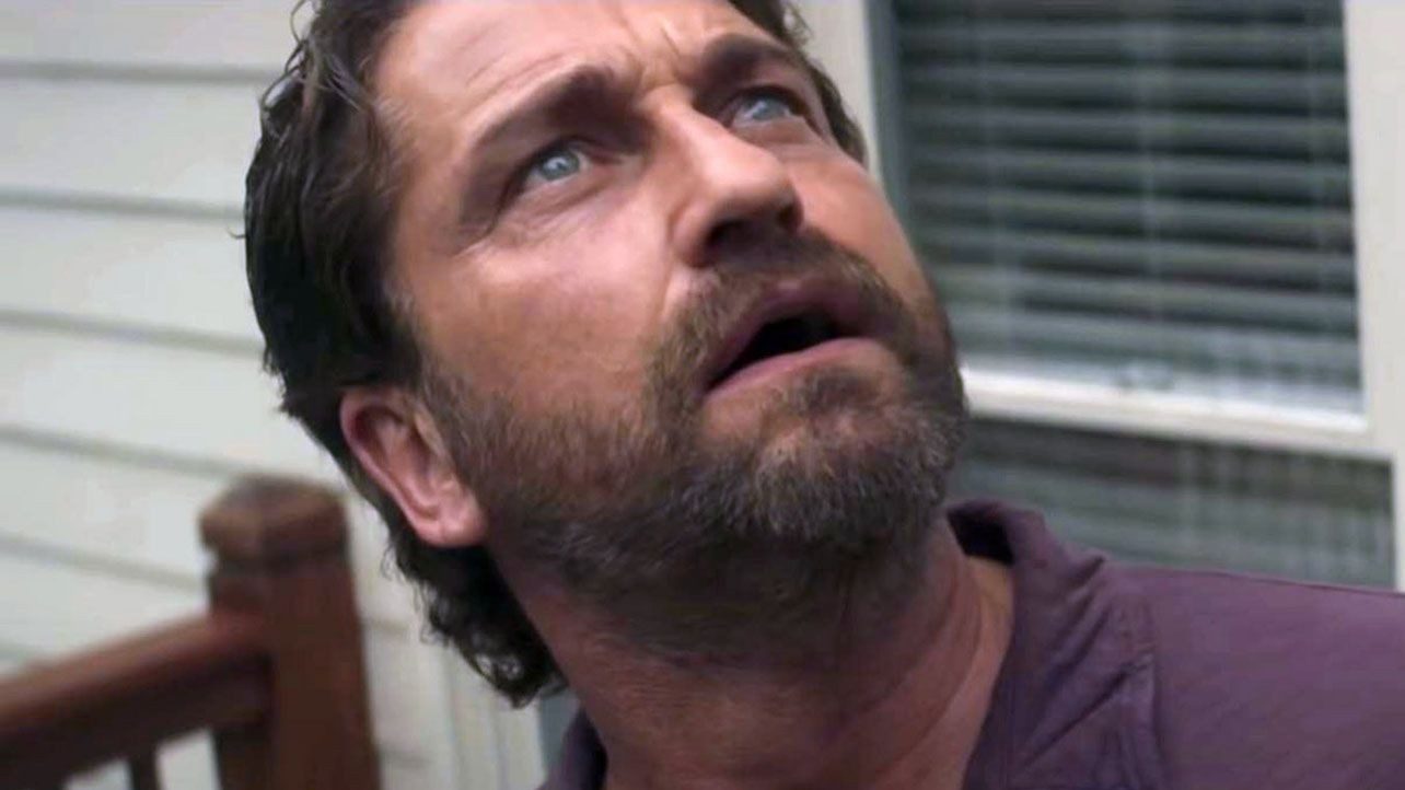 Gerard Butler stares and looks up in Greenland.