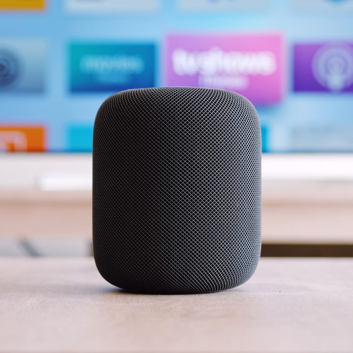The Apple HomePod on a desk.