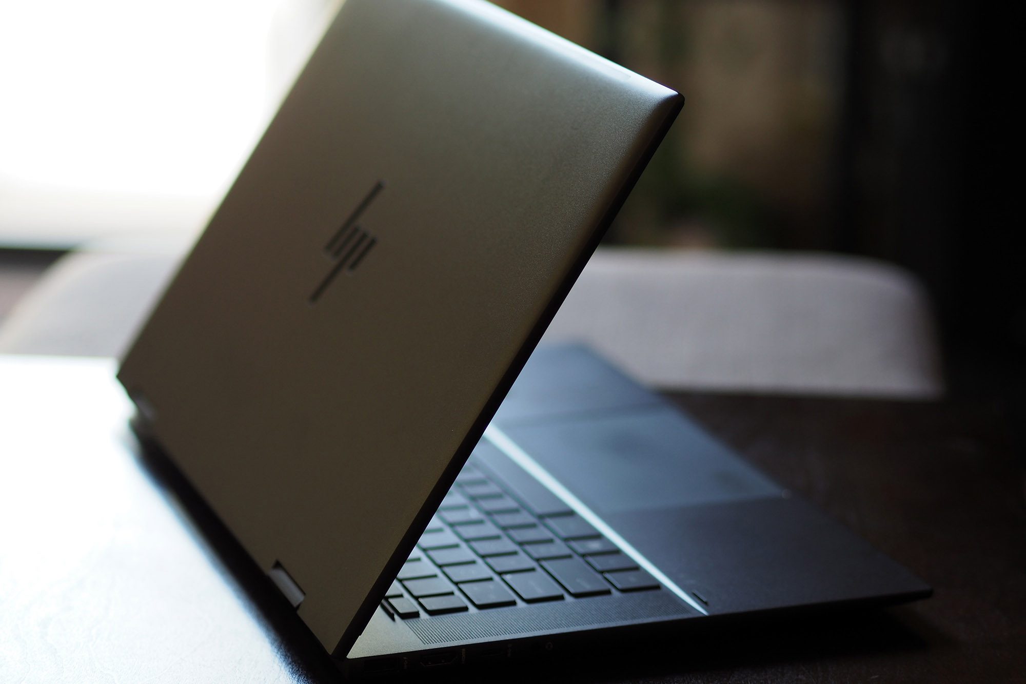 HP Envy x360 15 side view showing lide and keyboard deck.