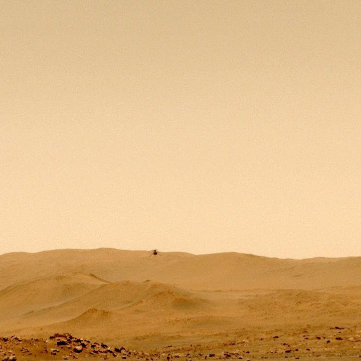 NASA's Ingenuity Mars Helicopter's fifth flight was captured on May 7, 2021, by one of the navigation cameras aboard the agency's Perseverance rover. This was the first time it flew to a new landing site. NASA's Ingenuity Mars Helicopter's fifth flight was captured on May 7, 2021, by one of the navigation cameras aboard the agency's Perseverance rover. This was the first time it flew to a new landing site.