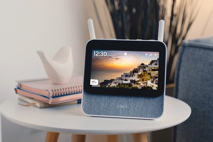 A Lorex Smart Home Security Center sits on a table.