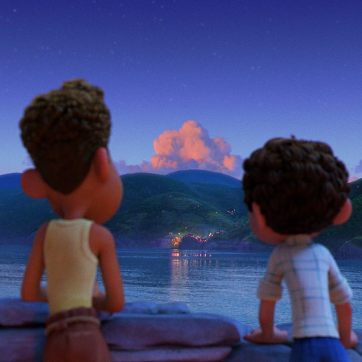 Alberto and Luca looking across the water at the town in Pixar's Luca.