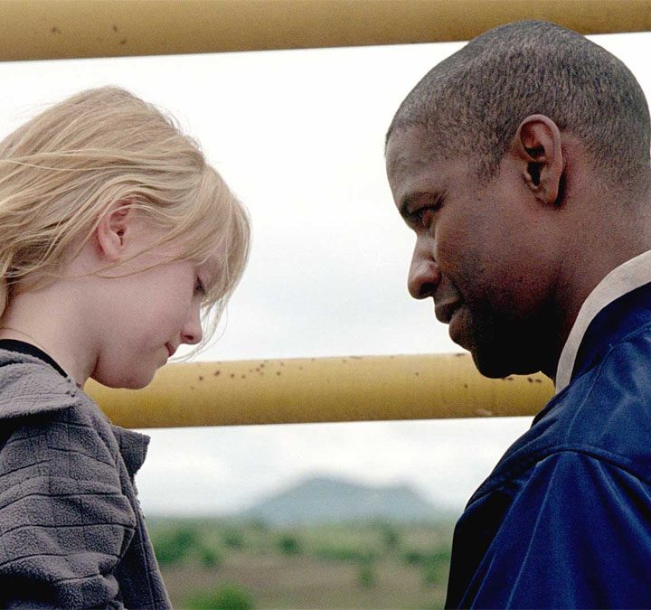 Denzel Washington smiles at Dakota Fanning in Man on Fire.