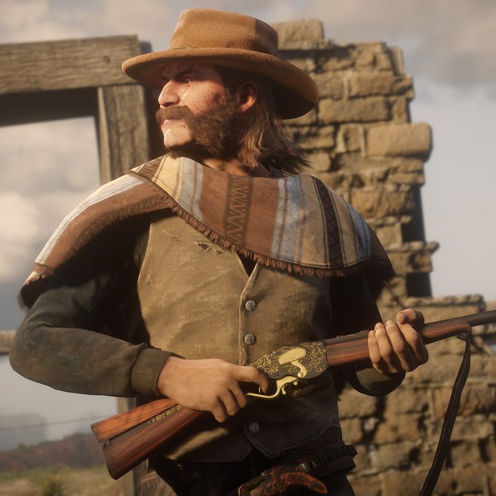 A cowboy takes cover in Red Dead Online.