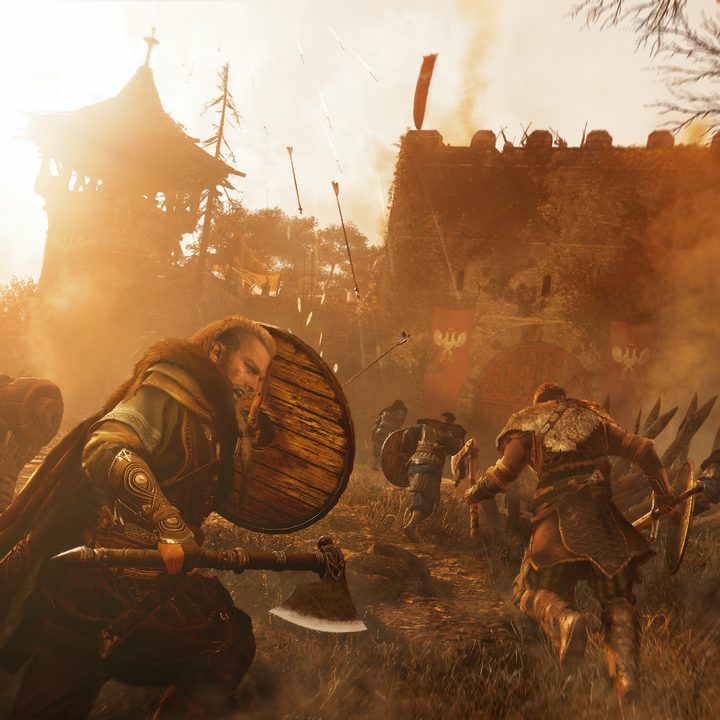 A Viking holds a shield durign a siege in Assassin's Creed Valhalla.
