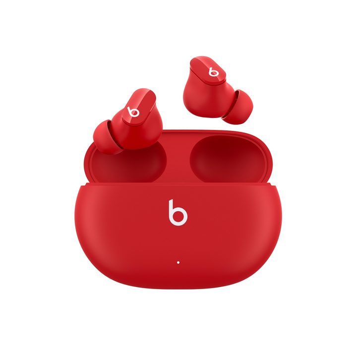 red beats studio buds in case against white background