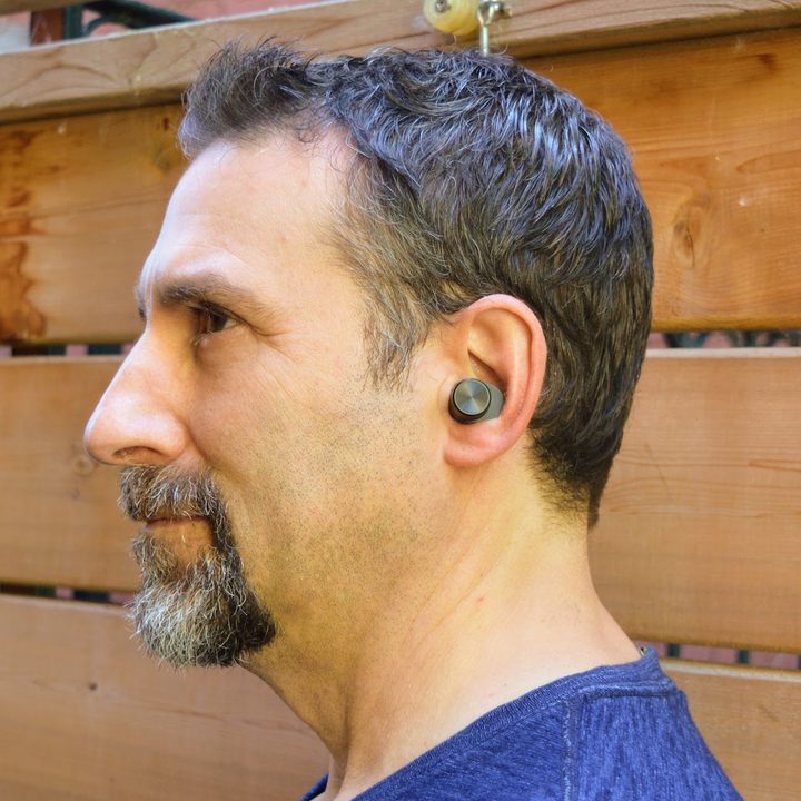 Bowers & Wilkins PI5 true wireless earbuds being worn.