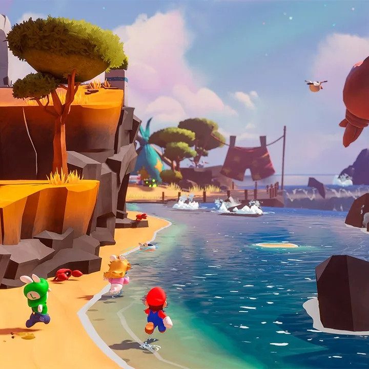 Mario, Rabbid Peach, and Rabbid Luigi explore a beach in Mario + Rabbids: Sparks of Hope.