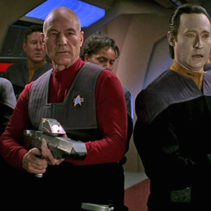 Captain Picard, Commander Data, and other crew in Star Trek: First Contact.