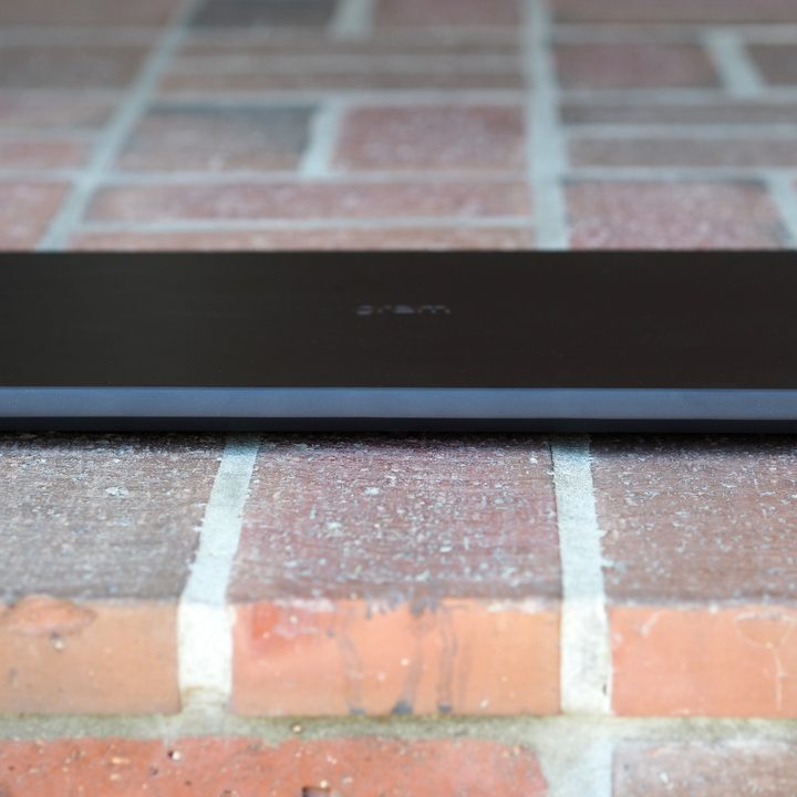 LG Gram 17 2021 closed, sitting on a brick walkway.