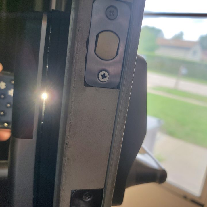 There is a noticeable gap between the interlock mechanism and the door handle on the Lockly Duo.