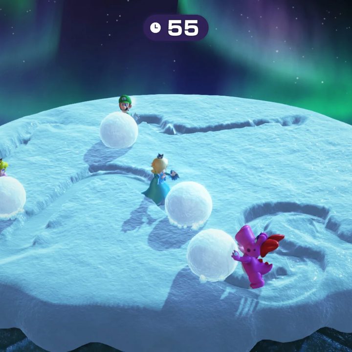 Mario Party players roll snowballs in Mario Party Superstars.