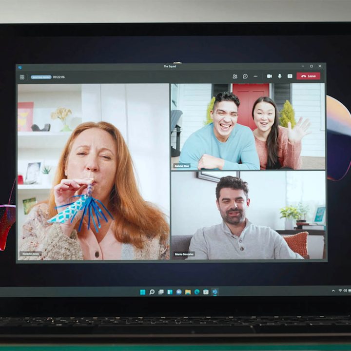 A video call in Microsoft Teams is displayed on a laptop.