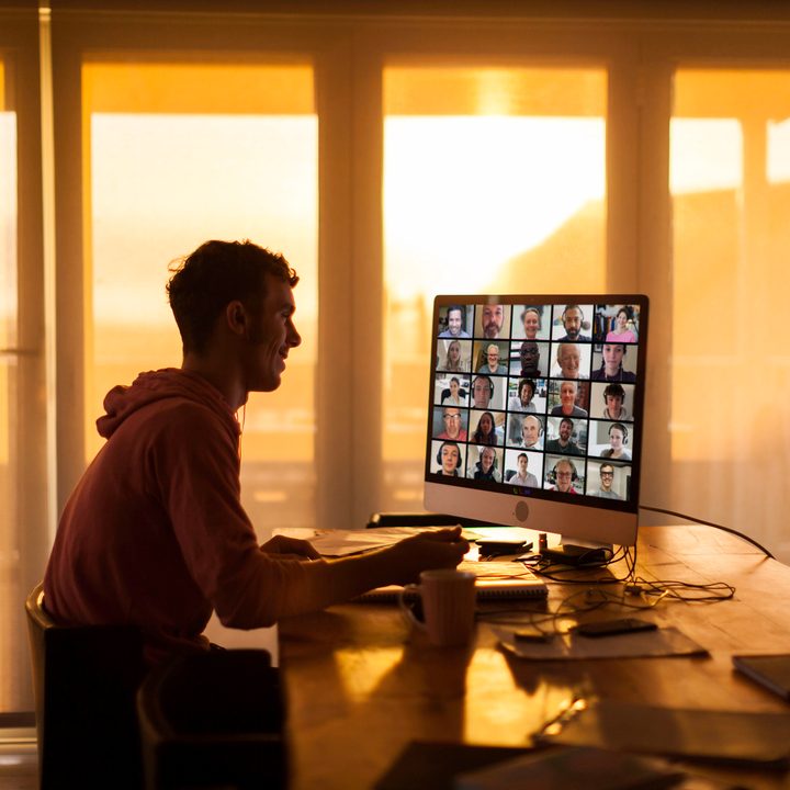 Man engaged in a video call.