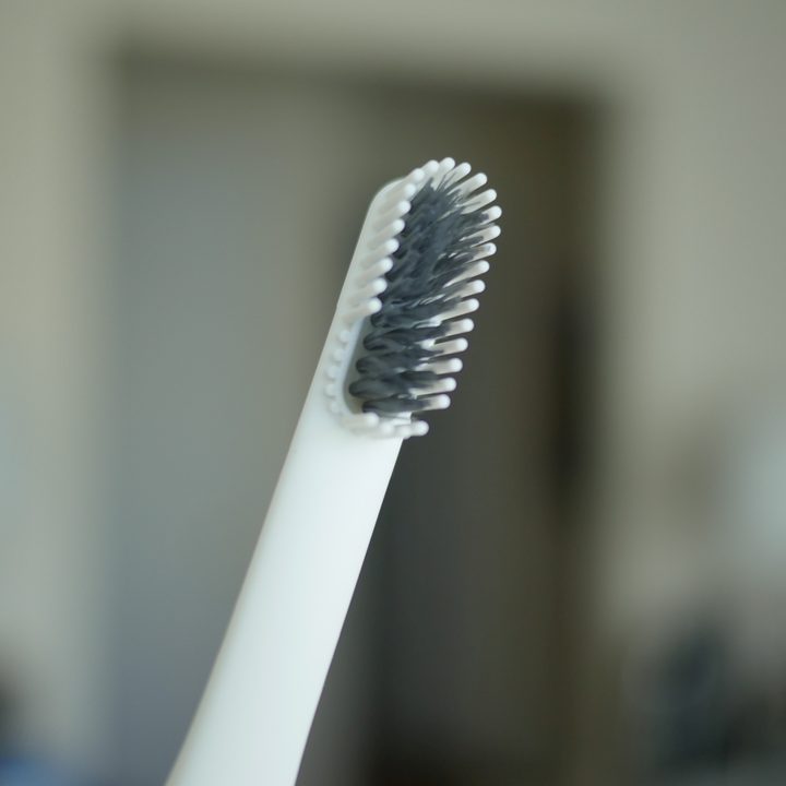 Missing bristles on the PomaBrush silicone toothbrush.