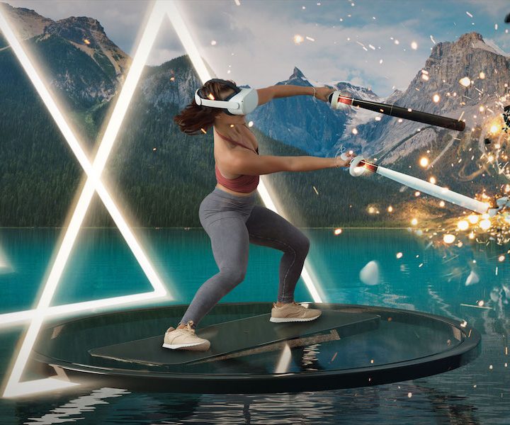 A player swinging controllers in Supernatural Fitness VR.
