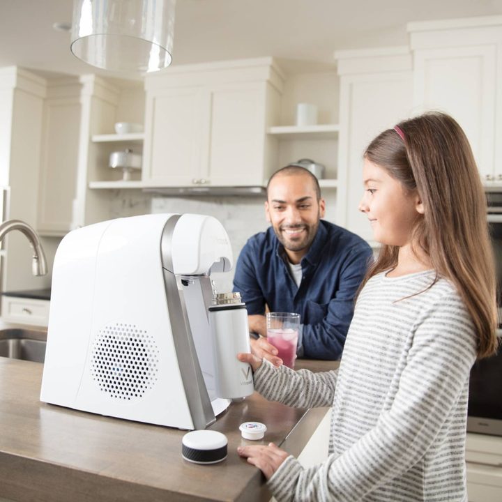 Family making a drink with Vitapod drink system.