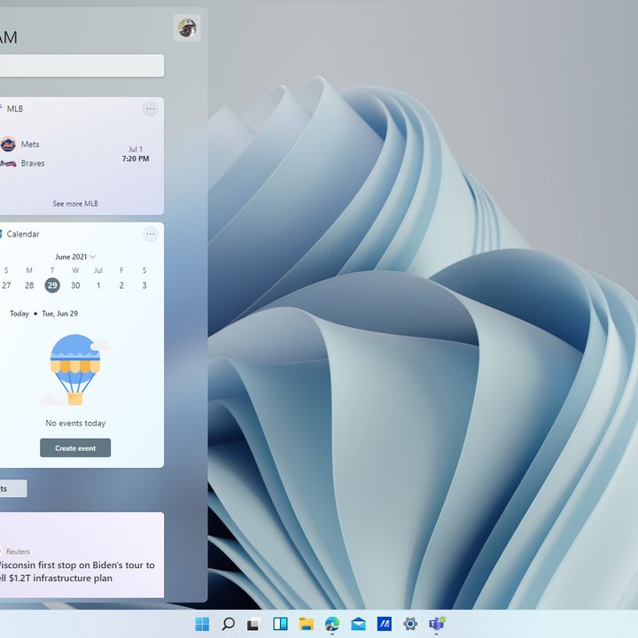 The windows 11 widgets panel open on the left side of the screen.