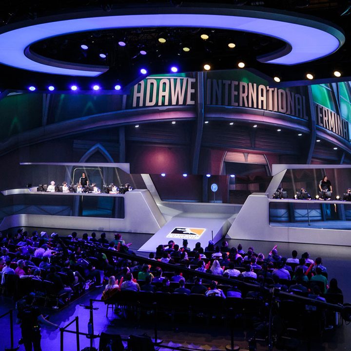 A live Overwatch League event in an arena.