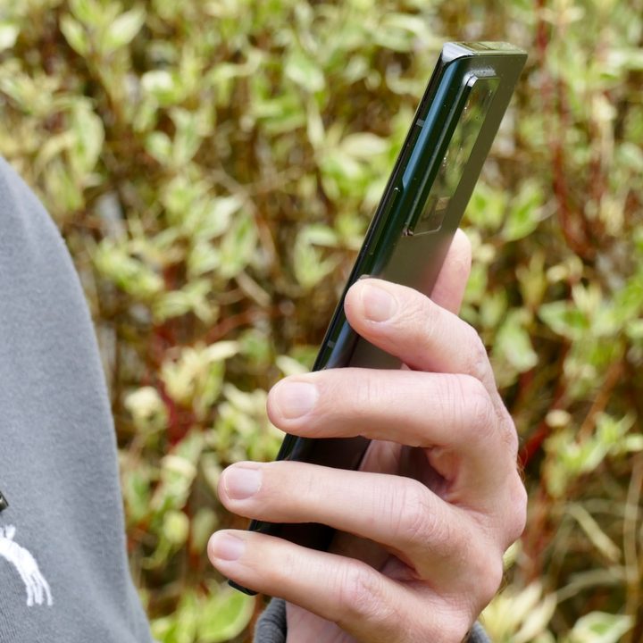 ZTE Axon 30 Ultra in hand from the side