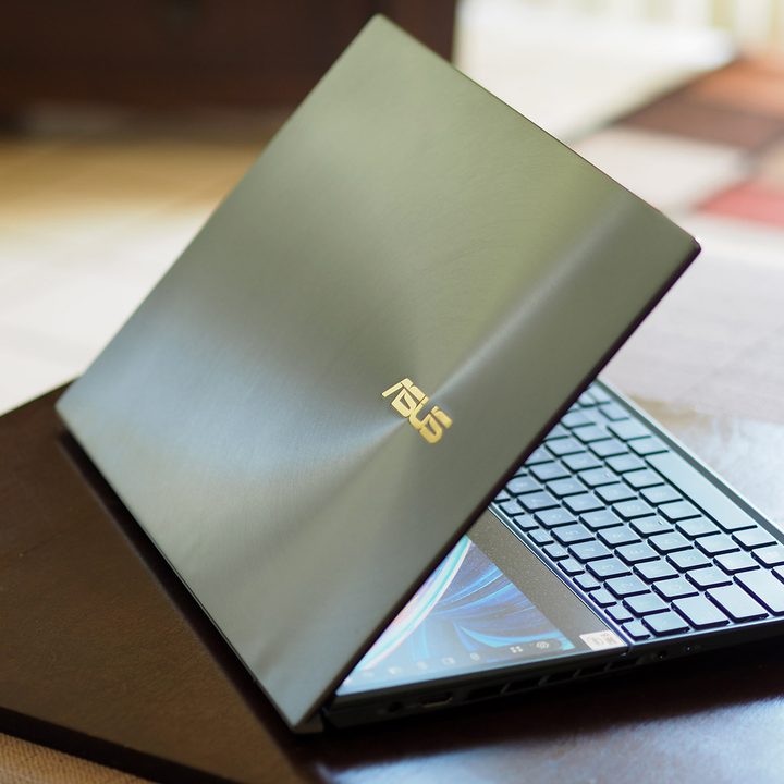 Asus ZenBook Pro Duo sitting on table.