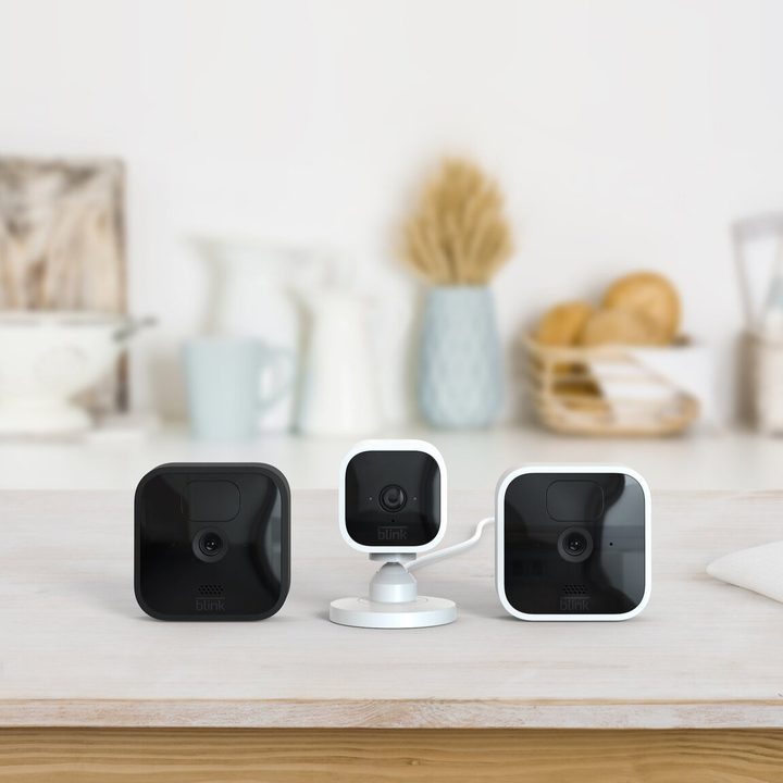Blink Home System security cameras on a kitchen counter.