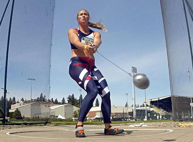 Hammer throw athlete Britney Henry in mid-swing.
